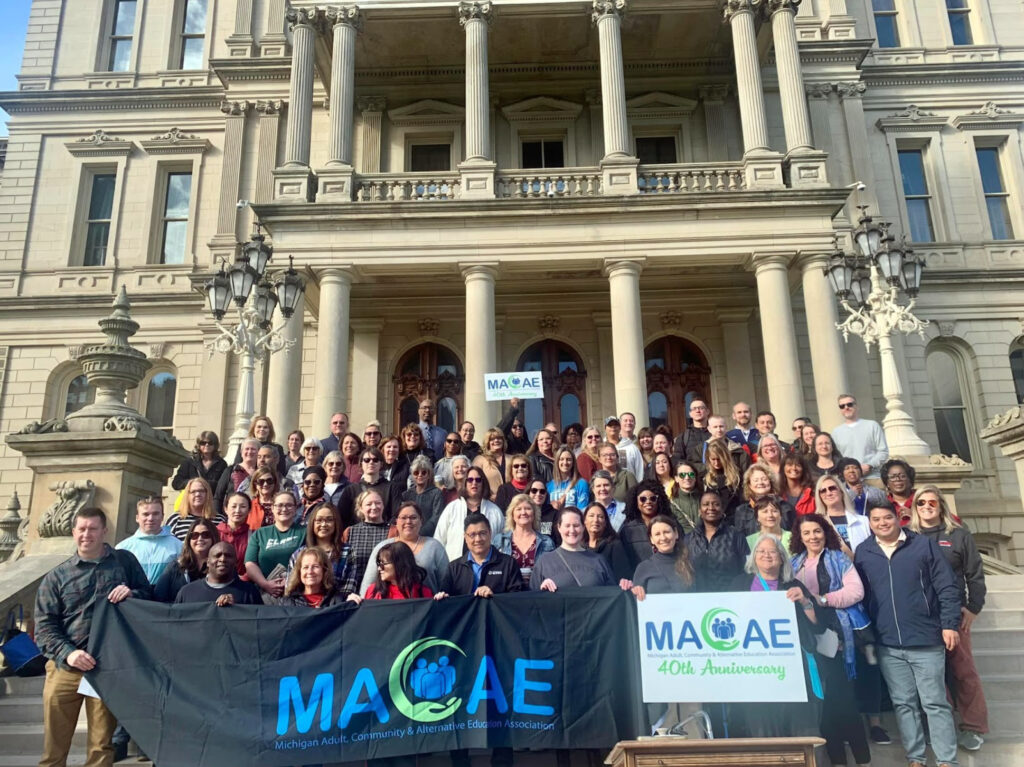 group of people on steps of capital building